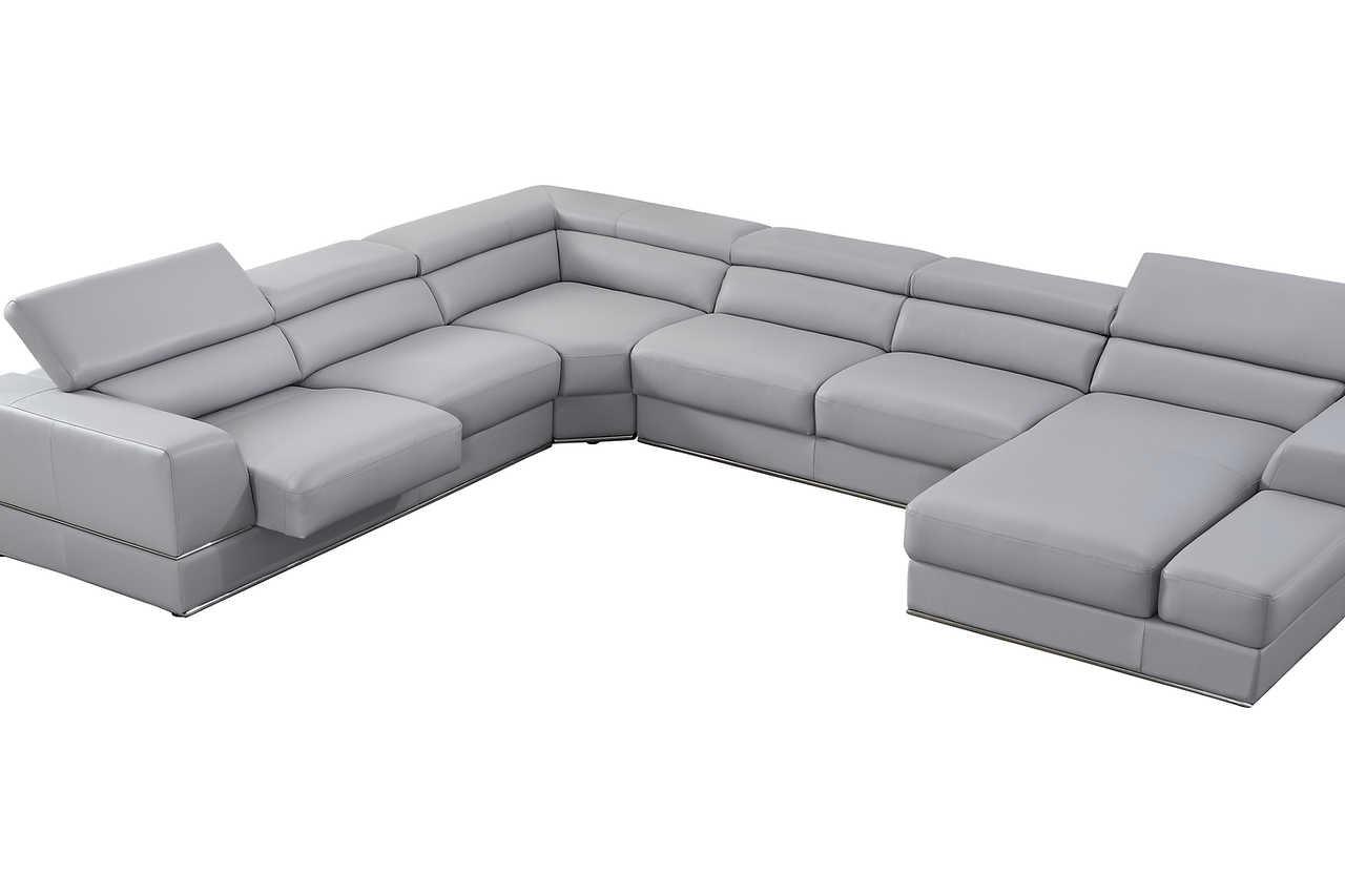 Room view of Pella Light Gray Leather RAF Sectional showing chaise
