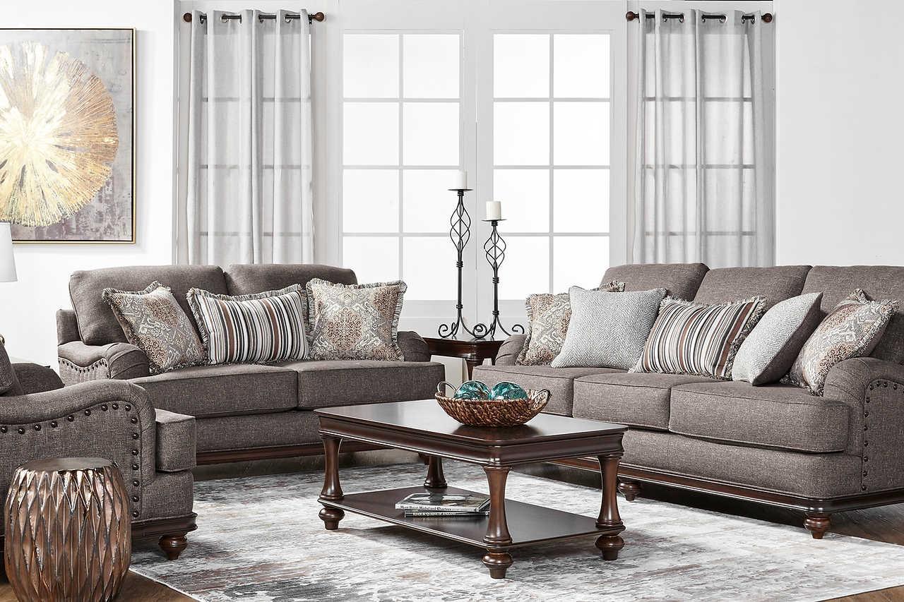 Front view of driftwood brown and gray fabric upholstered sofa and loveseat set