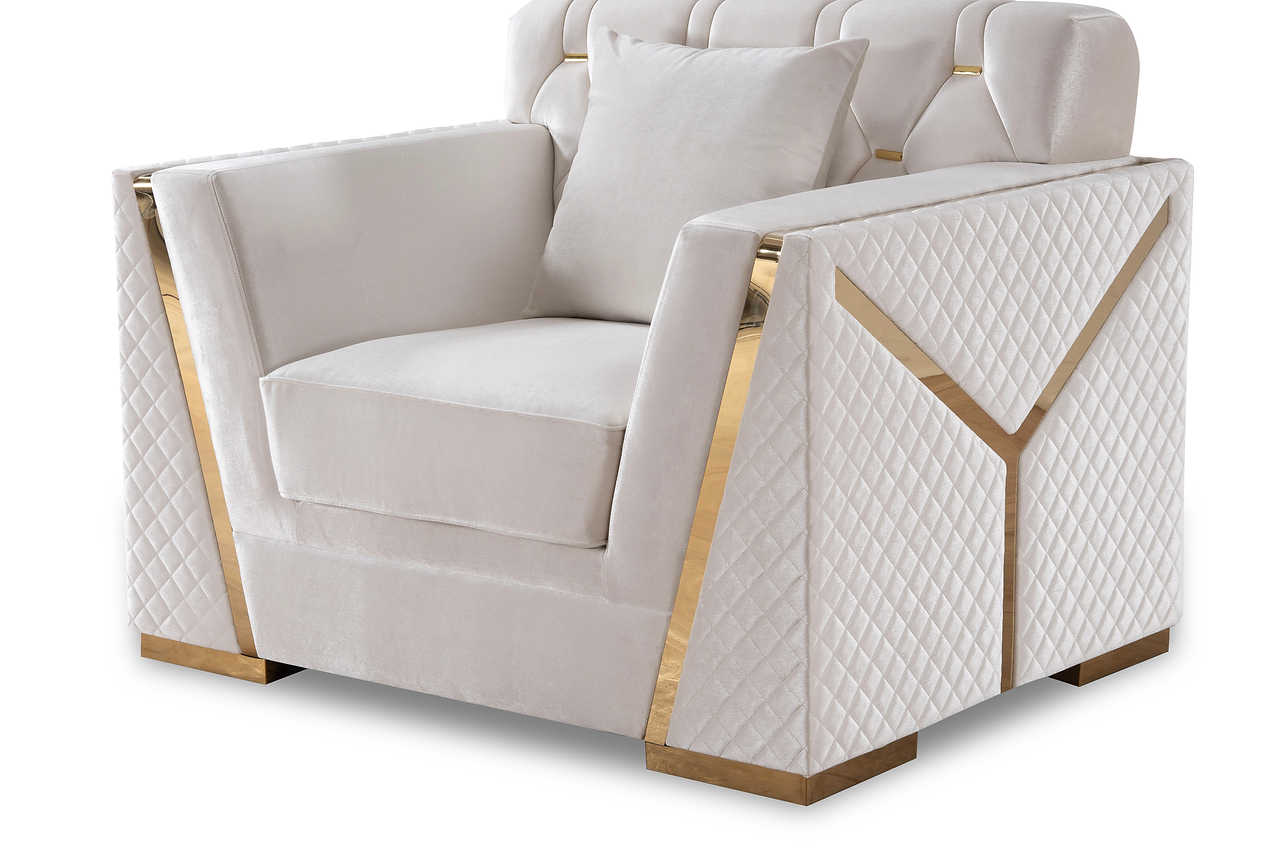 Close detail of sofa arm with gold accents