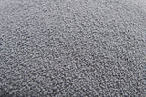 Close-up of bed corner and fabric texture