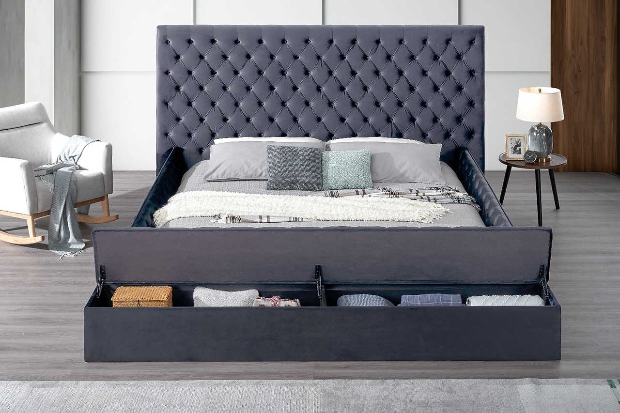 Close-up of tufted grey headboard with USB and Bluetooth controls