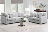 Side view of Tarra Gray Fabric sofa and loveseat