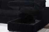 Raha Black Sectional Sofa arranged in living room setting