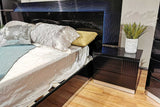 Bedroom setting with Modena Black LED Panel Bedroom Set bed
