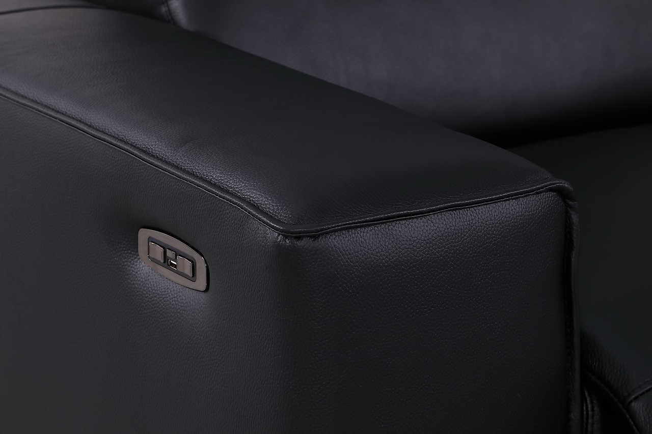Picasso black sectional sofa in modern living room setting