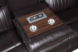 Brown AirLeather reclining loveseat with power outlet