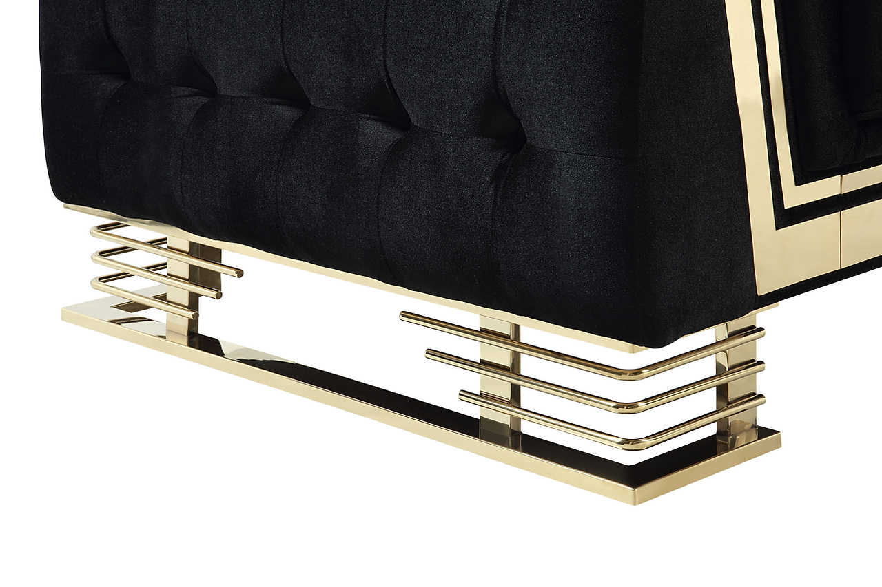 Close-up detail of black and gold upholstery on living room set