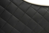 Rani Black Dining Chair angled view with solid wood legs