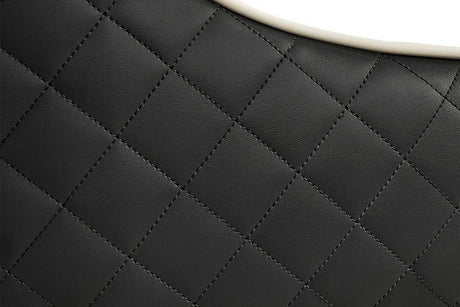 Rani Black Dining Chair angled view with solid wood legs