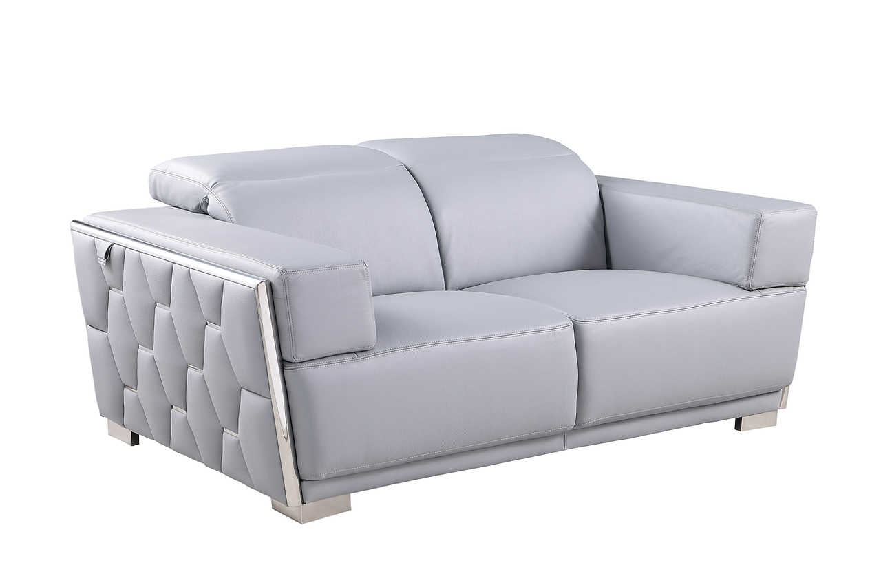 Hexor light blue Italian leather sofa and loveseat living room setup