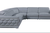 Close-up detail of light blue leather upholstery on sectional sofa