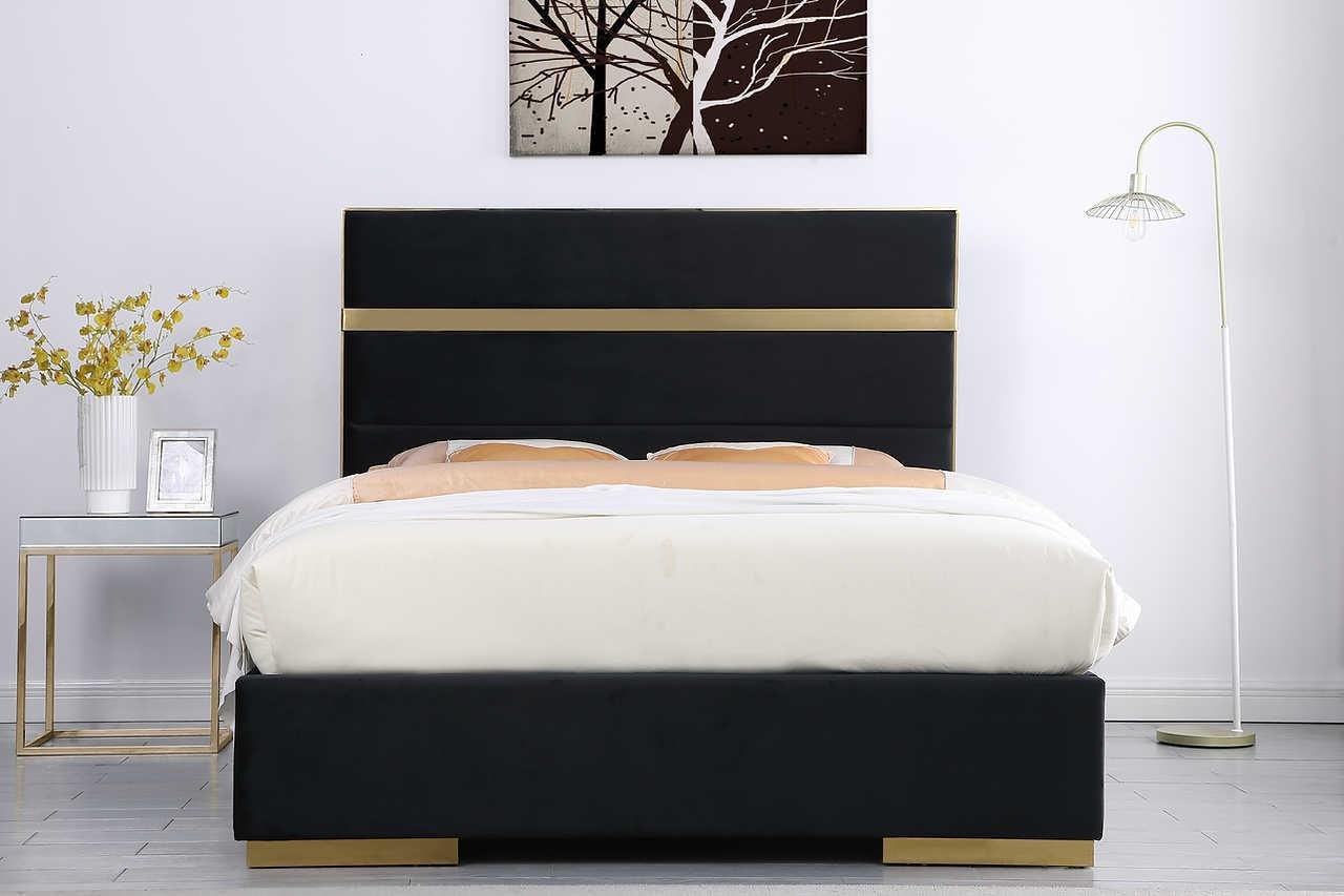 Close-up of velvet upholstery and gold detailing on Cartier Platform Queen Bed