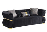 Close detail of black velvet upholstery and gold accents on Anna Living Room chair