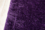 Afro Shag Violet Medium Rug laid flat showcasing texture and color