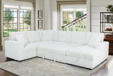 Side view of Raha beige storage sectional with chaise