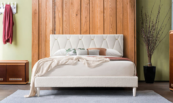 Kiran cream upholstered platform king bed, front angle view