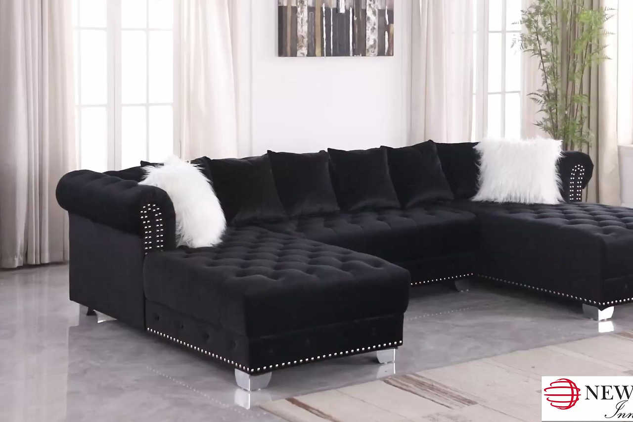 Jordan II black velvet tufted sectional sofa in living room setting