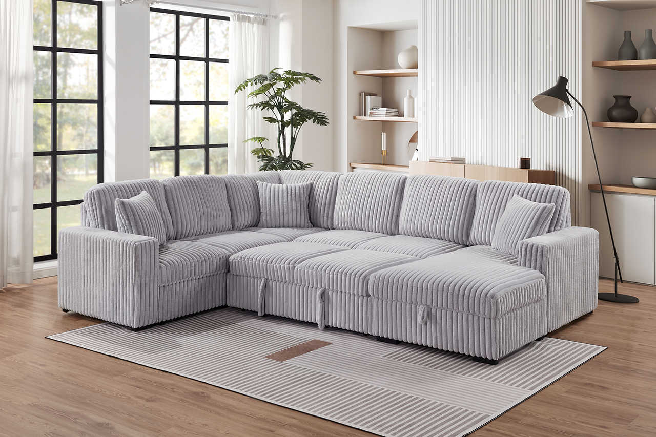 Side view of Raha Grey Fabric Storage Sectional showing chaise