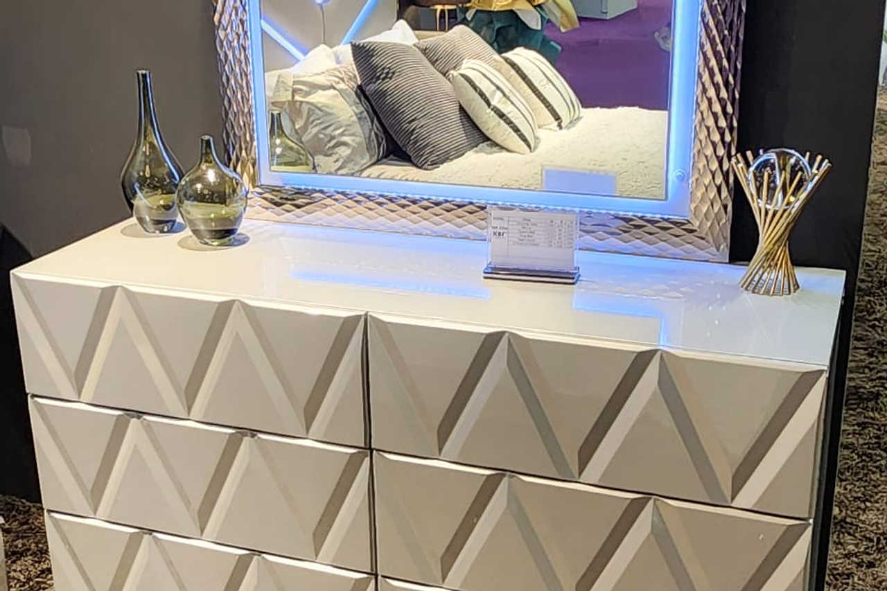 Vera dresser alongside Vera chest in showroom