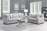 Close-up detail of gray fabric upholstery on Tarra set
