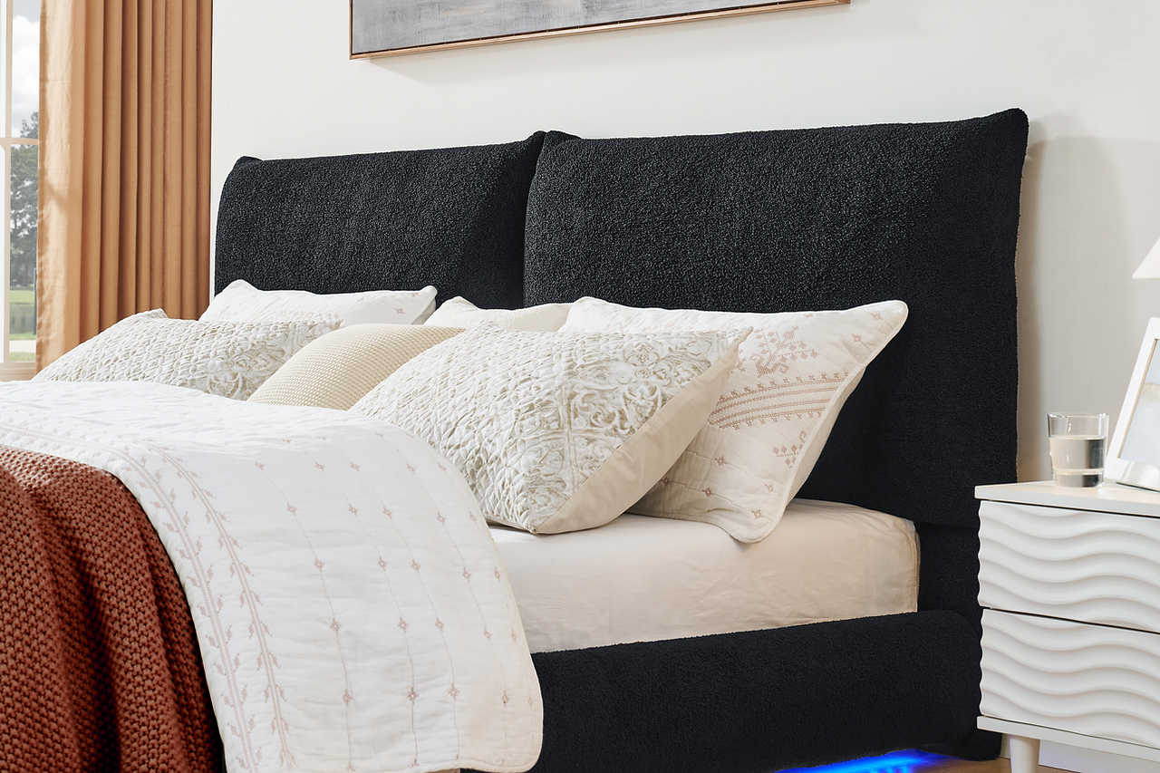Close-up of teddy fabric upholstery on Zima king bed