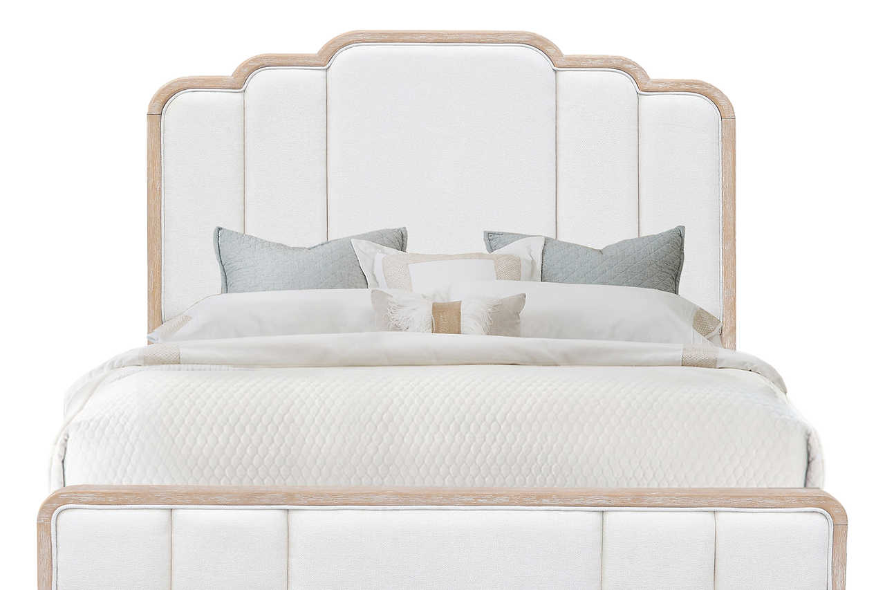 Side view of Laguna light brown gray upholstered panel bed