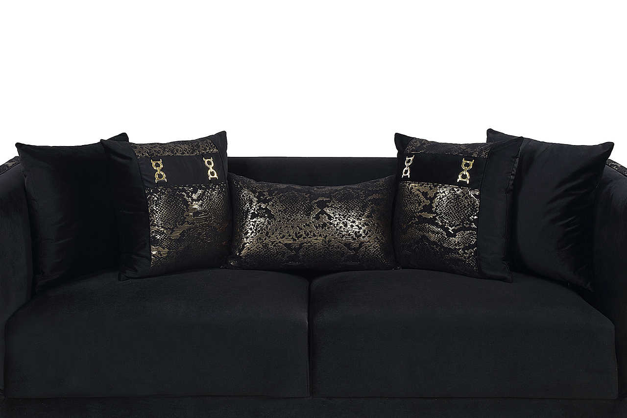Close-up detail of Monaco Black Velvet upholstery and gold accents