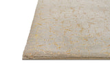 Decorative setting with Rabbit Tex champagne and gold rug on floor