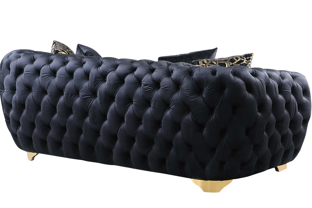Side view showing sofa and loveseat in black velvet