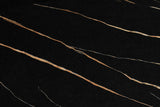 Unico dining table black and gold marble-effect top side view
