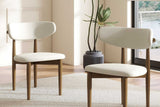 Side view of Ash Cream Dining Chair highlighting ash wood legs and linen seat