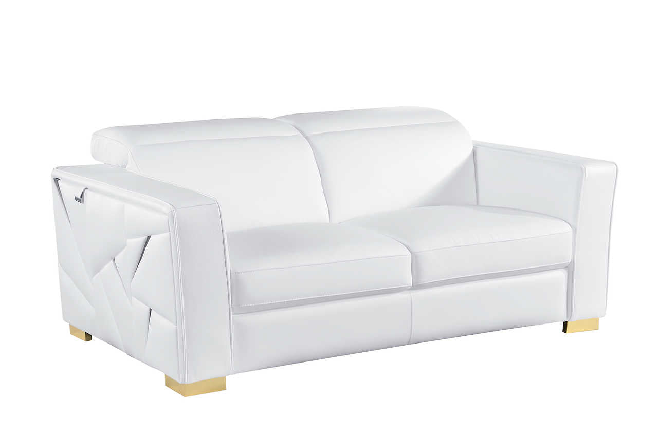 Close-up of Astra gold accent on white leather sofa