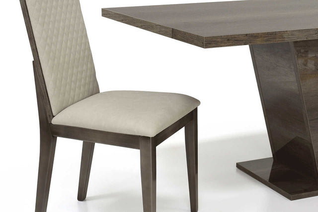 Medea Leather Dining Chair side view showcasing vintage oak and burnished chrome