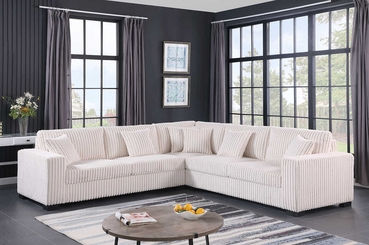 Living room view with Comfy II Cream sectional sofa