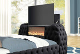Close-up of black tufted upholstered headboard