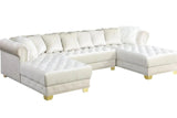 Detail of tufted velvet and gold nailhead accents