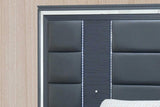 bedroom view of Meg Gray Upholstered Storage Platform Bedroom Set king bed