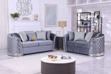 Close-up of seat upholstery and included pillow on Athena Grey Chair