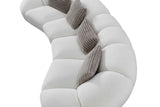 Close-up detail of white soft fur fabric on Big Cloud sectional