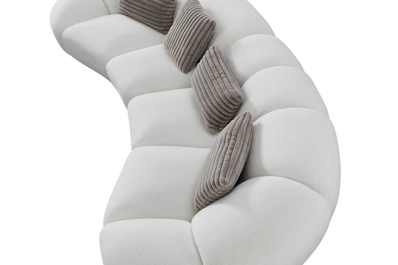 Close-up detail of white soft fur fabric on Big Cloud sectional
