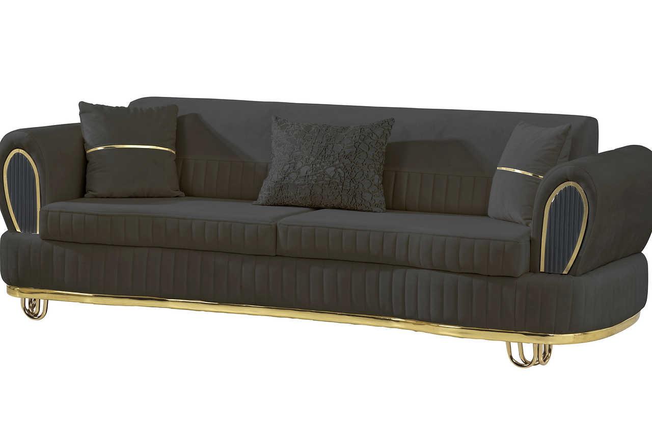 Close-up of velvet upholstery and gold leg design on Kelebek chair