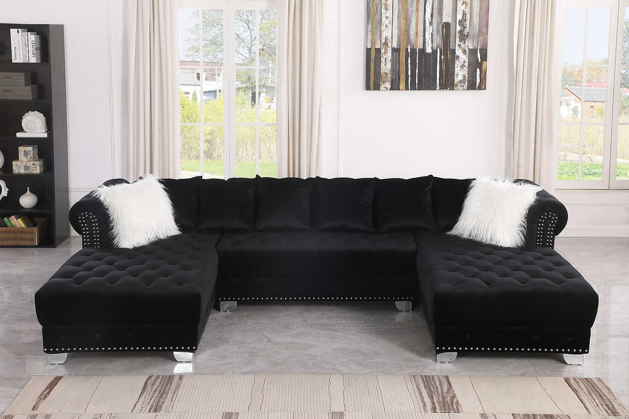 Side angle of Jordan II black velvet tufted sectional sofa