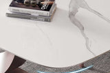 Side angle of dining table showing carbon steel legs