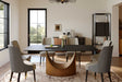Lexi dining table front view showing matte black sintered stone top and U-shaped base