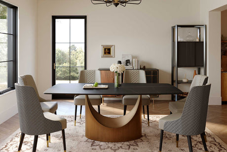 Lexi dining table front angle showing matte black sintered stone top and U-shaped base