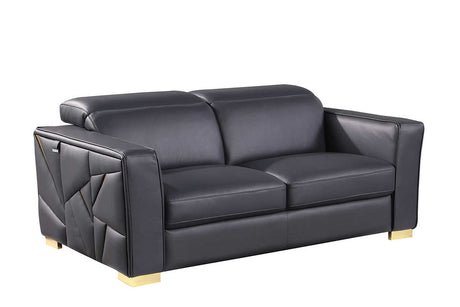 Close-up of dark navy Italian leather match upholstery with gold trim
