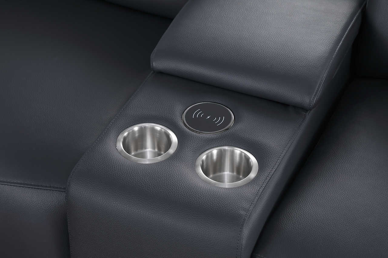 Detail of power headrest on navy leather sectional