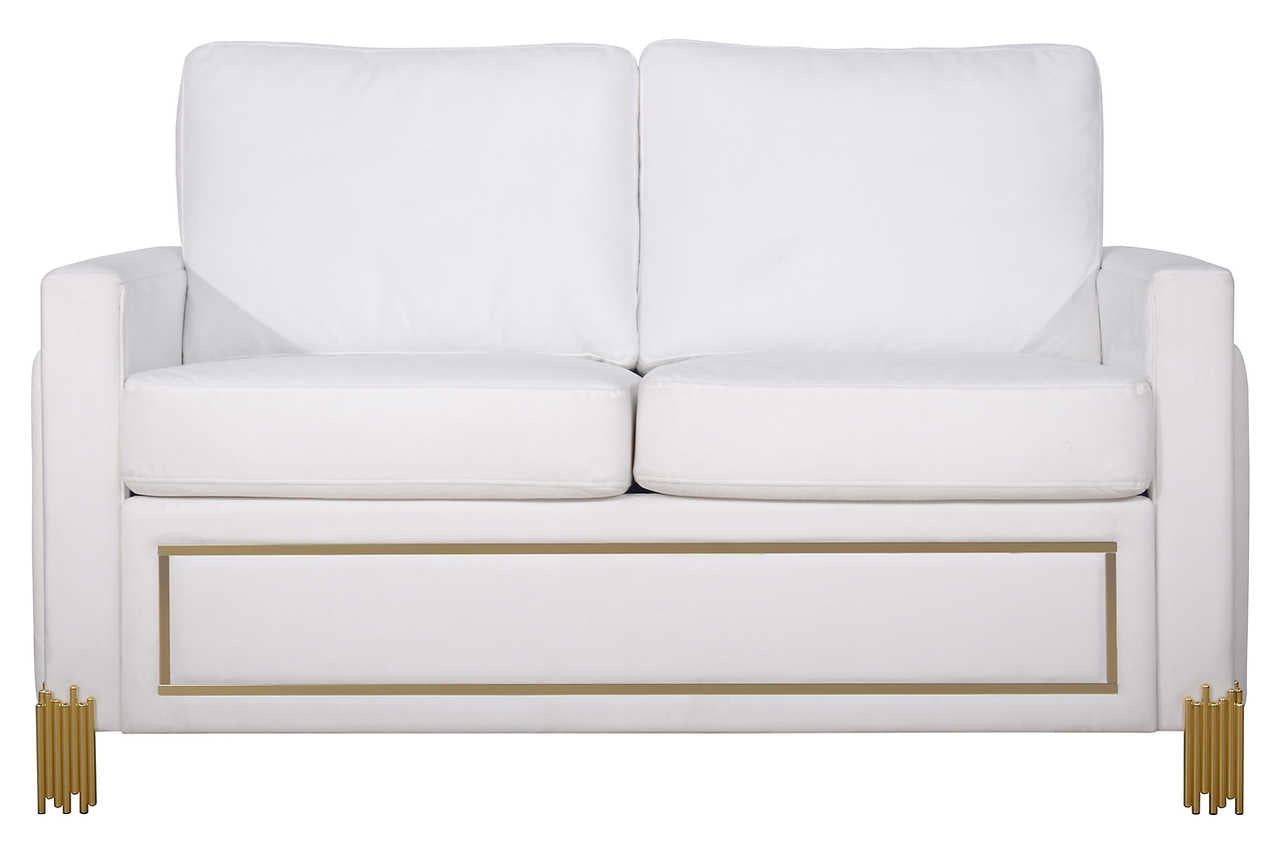 Close-up detail of white velvet upholstery and gold accents