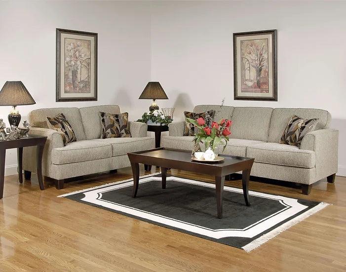 Soprano Beige Fabric Loveseat angled view with two accent pillows