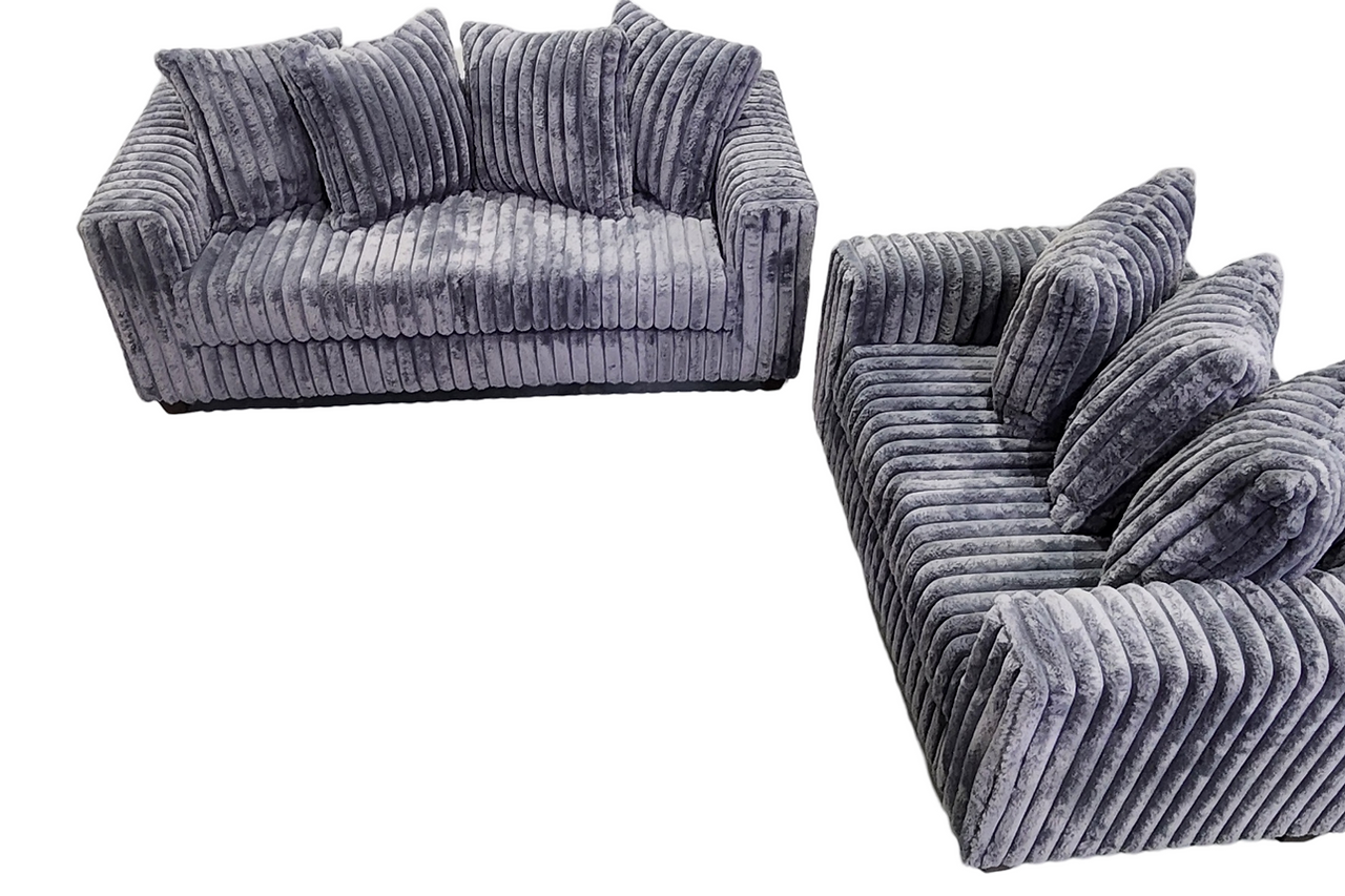 Close-up detail of grey striped fabric upholstery on Gia Gray Living Room Set